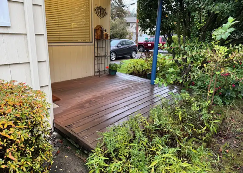 Weathered cedar porch deck before refinishing at a residential property in the Portland metro area.