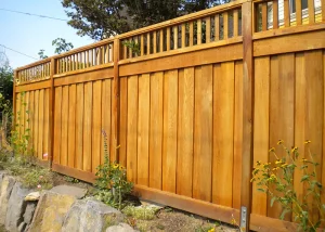 Clear cedar picture frame overlap fence with 1x2 top rail and metal brackets in Oregon